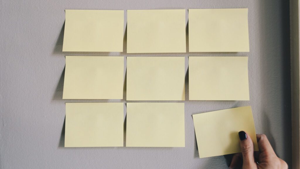 9 blank Post-its on the wall