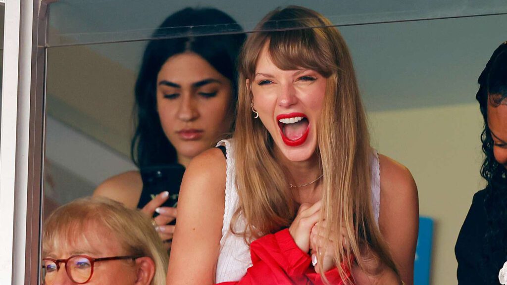 Taylor Swift cheering from the stands
