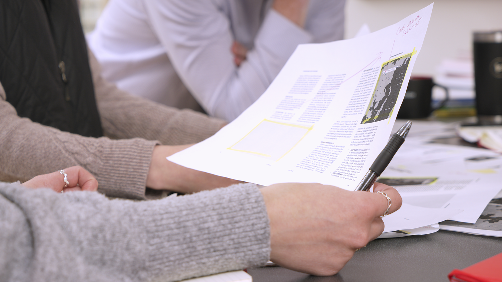 Holding a printed StoryGuide page