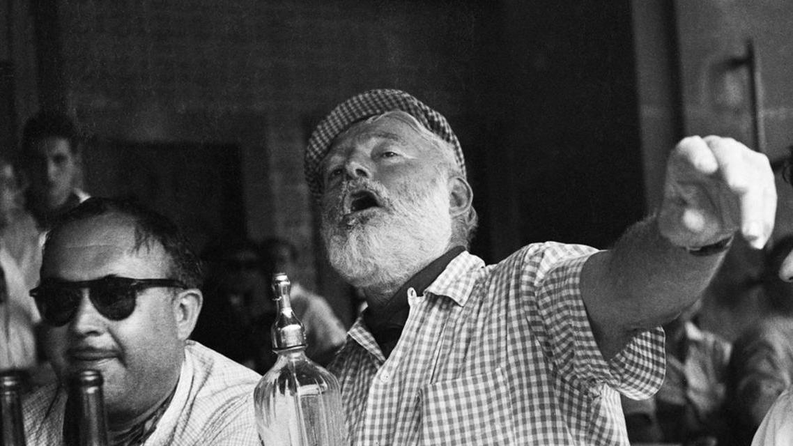 Man in a hat at the bar