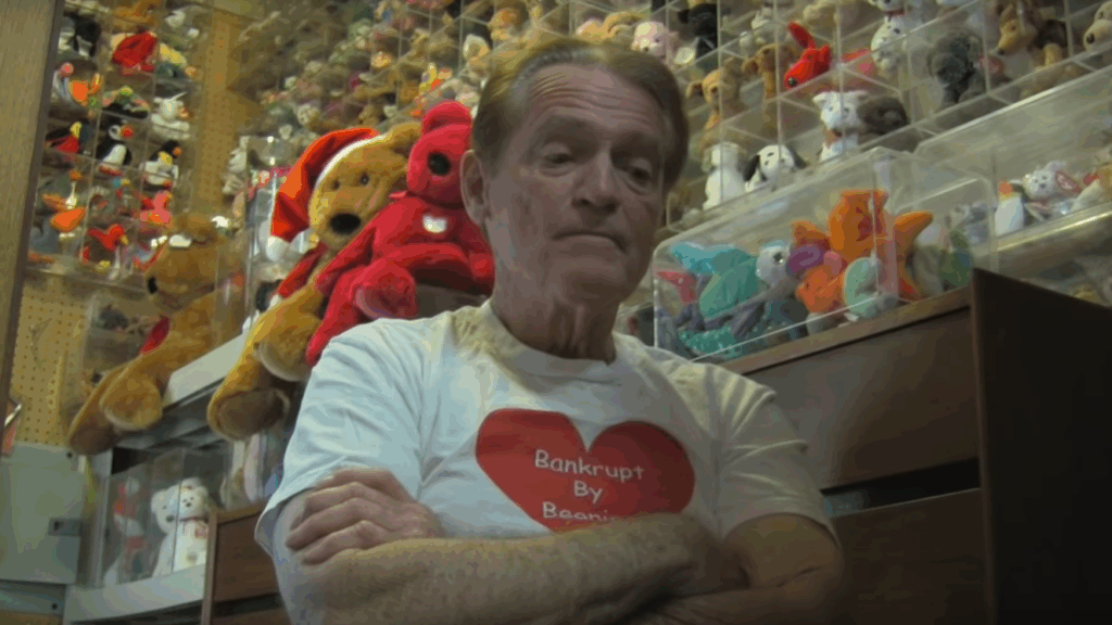 Man in "Bankrupt by Beanies" t-shirt