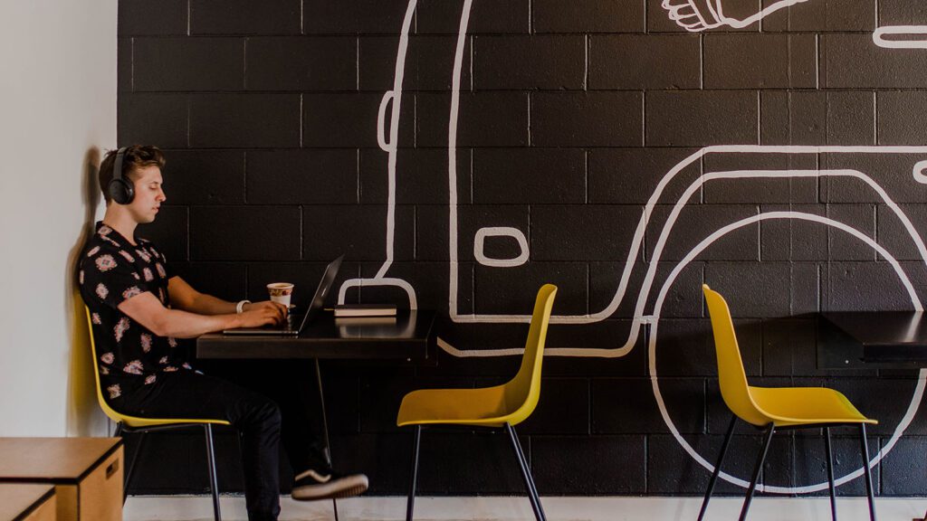 Working on a laptop at a cafe