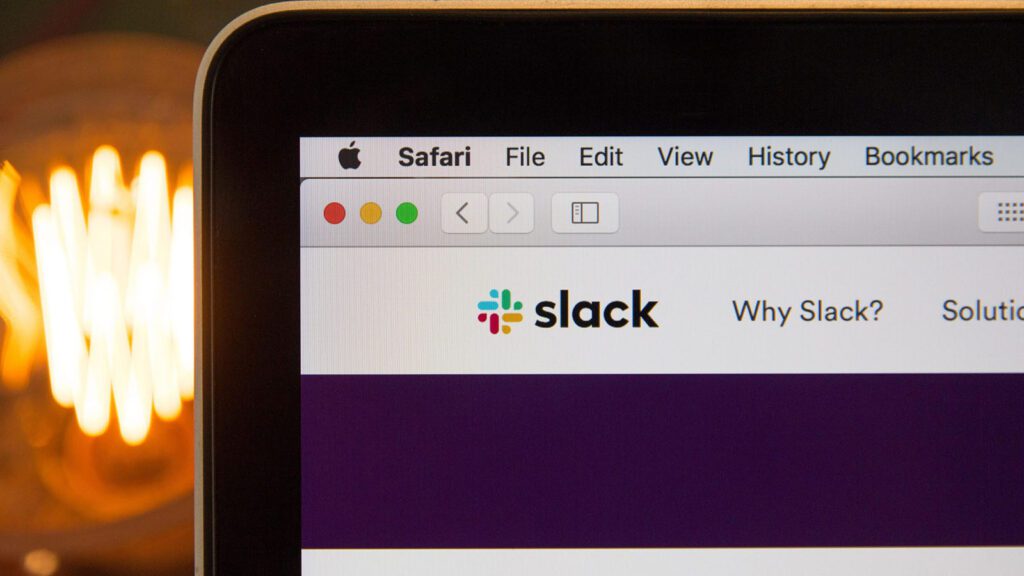 A computer with Slack on it